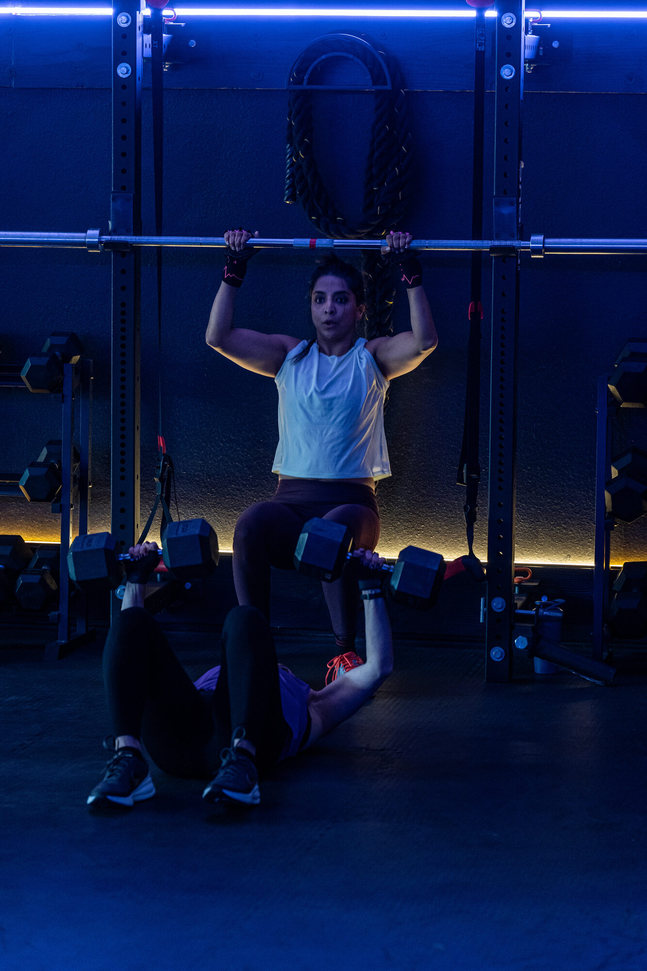 Member doing pull-ups in a small-group lift class